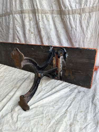A Victorian swing back pitch pine railway / chapel bench