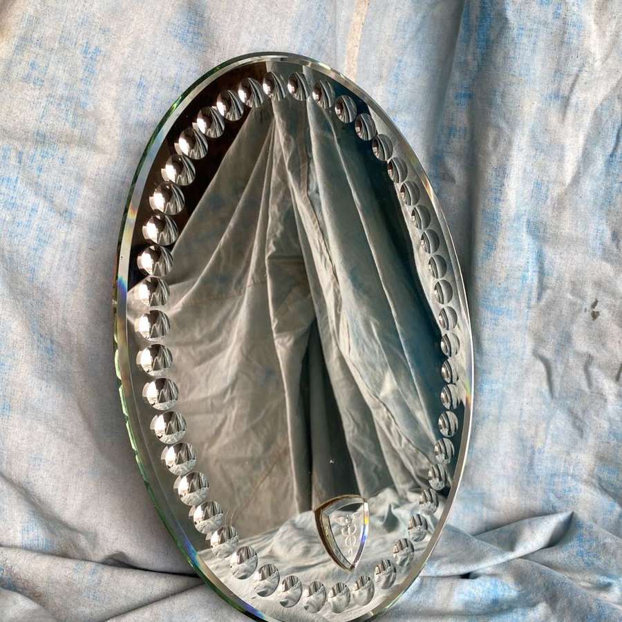 An oval antique sorcerer's / witches mirror