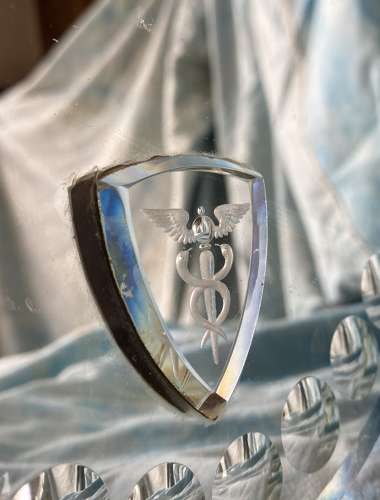 An oval antique sorcerer's / witches mirror