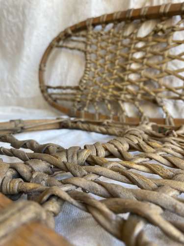 A pair of antique early 20th century Canadian snowshoes