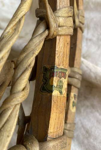 A pair of antique early 20th century Canadian snowshoes