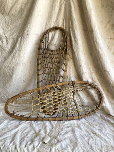 A pair of antique early 20th century Canadian snowshoes