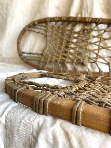 A pair of antique early 20th century Canadian snowshoes