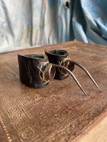A pair of antique uncommon 19th century cock fighting spurs