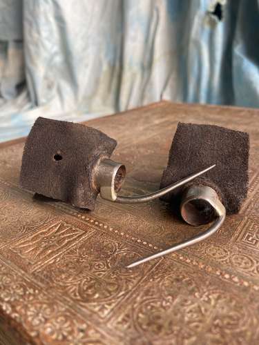 A pair of antique uncommon 19th century cock fighting spurs
