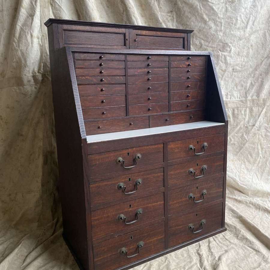 A set of antique Victorian oak dentist's drawers