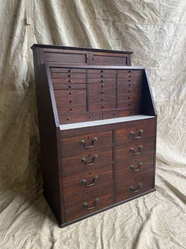A set of antique Victorian oak dentist's drawers