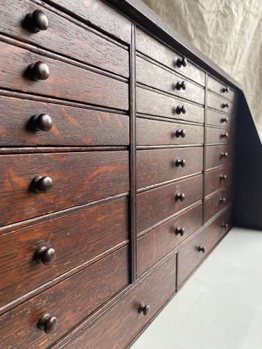 A set of antique Victorian oak dentist's drawers