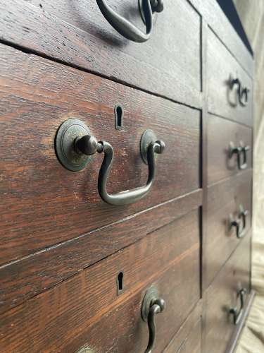 A set of antique Victorian oak dentist's drawers