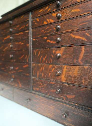 A set of antique Victorian oak dentist's drawers