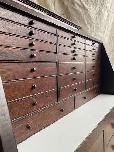 A set of antique Victorian oak dentist's drawers