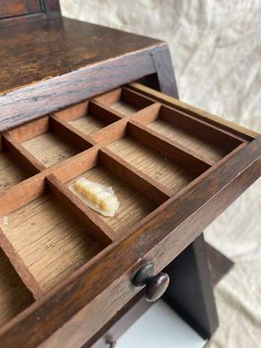 A set of antique Victorian oak dentist's drawers