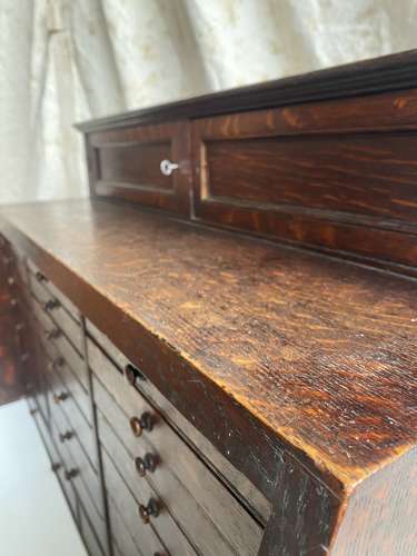 A set of antique Victorian oak dentist's drawers