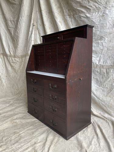 A set of antique Victorian oak dentist's drawers