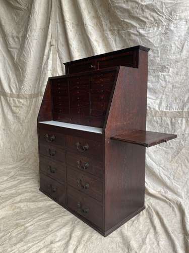 A set of antique Victorian oak dentist's drawers