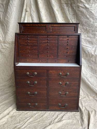 A set of antique Victorian oak dentist's drawers