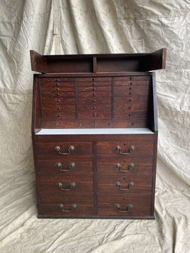 A set of antique Victorian oak dentist's drawers
