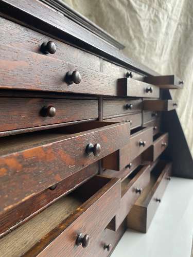 A set of antique Victorian oak dentist's drawers