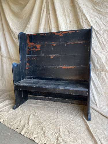 An antique Georgian painted pine tavern settle of small proportions