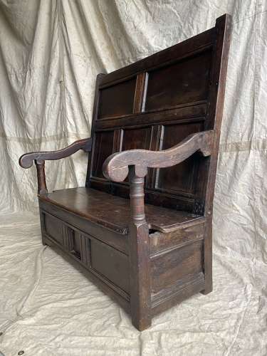A charming antique 18th century Welsh panelled oak box settle
