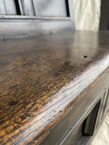 A charming antique 18th century Welsh panelled oak box settle