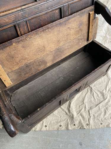 A charming antique 18th century Welsh panelled oak box settle