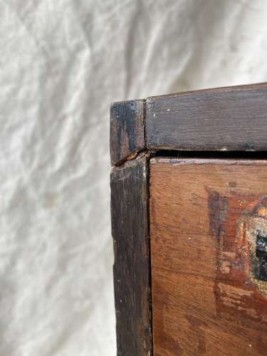 A bank of antique late Victorian apothecary shop drawers