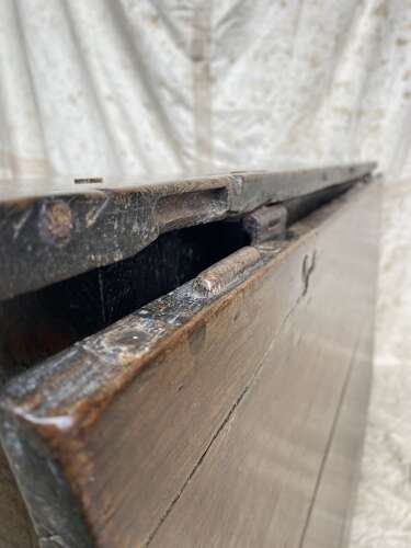 A large antique 18th century English oak gateleg table