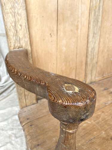An antique early 19th century vernacular pine box settle