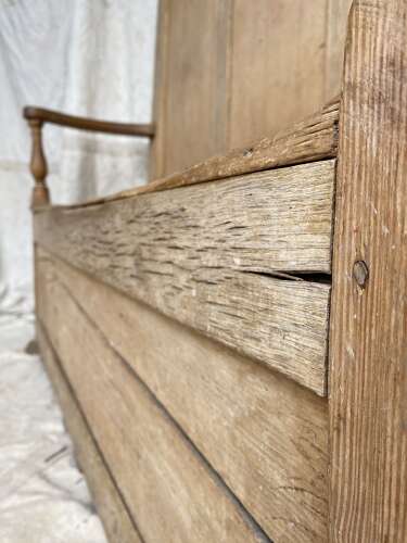 An antique early 19th century vernacular pine box settle