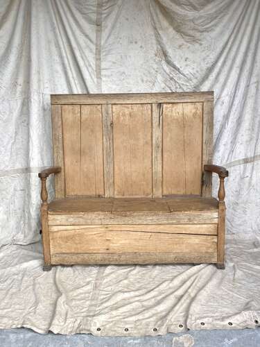 An antique early 19th century vernacular pine box settle