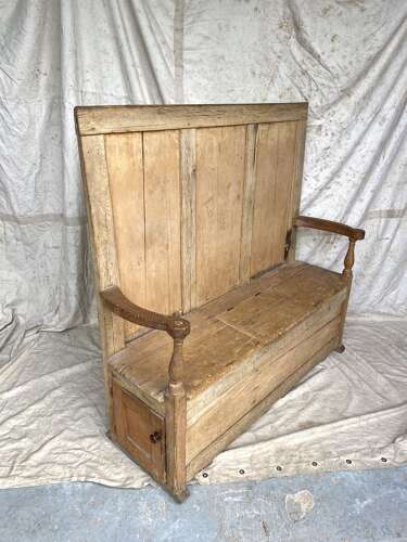 An antique early 19th century vernacular pine box settle