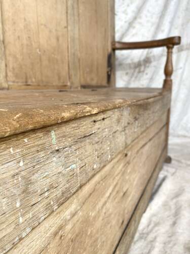 An antique early 19th century vernacular pine box settle