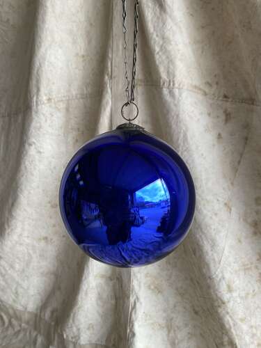 An antique 19th century mercury glass witch ball