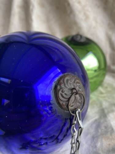 An antique 19th century mercury glass witch ball
