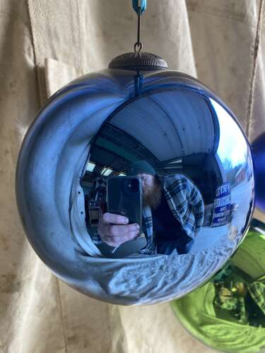 An antique 19th century mercury glass witch ball