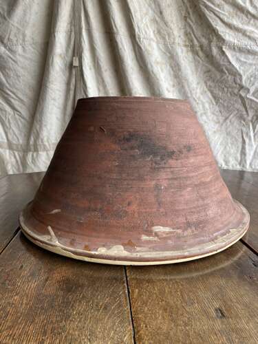 A large antique late 19th century Welsh glazed earthenware dairy bowl