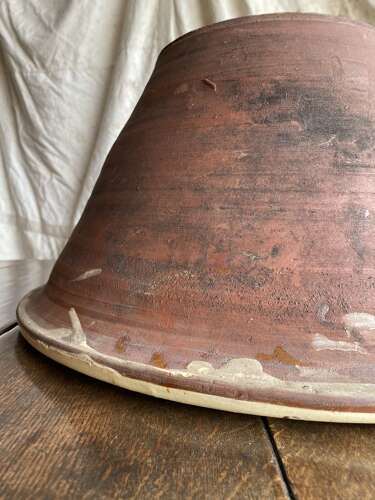 A large antique late 19th century Welsh glazed earthenware dairy bowl