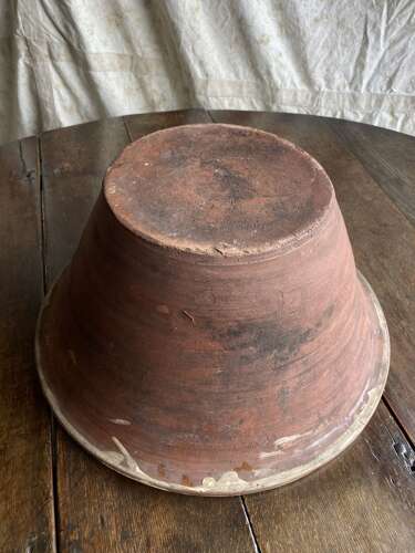 A large antique late 19th century Welsh glazed earthenware dairy bowl
