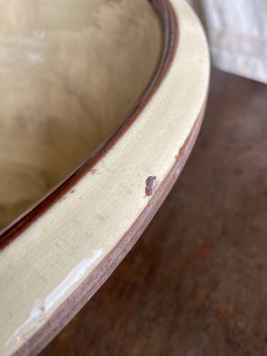 A large antique late 19th century Welsh glazed earthenware dairy bowl