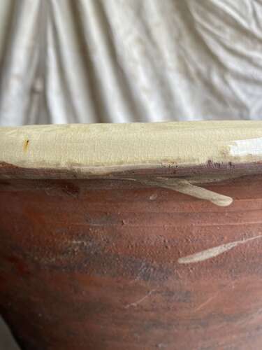 A large antique late 19th century Welsh glazed earthenware dairy bowl