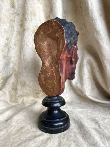 An antique late 19th century French plaster bust of a Faun or a Satyr