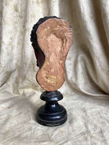 An antique late 19th century French plaster bust of a Faun or a Satyr