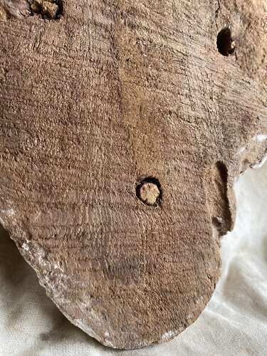 An ancient Egyptian gesso-painted wood sarcophagus mummy mask
