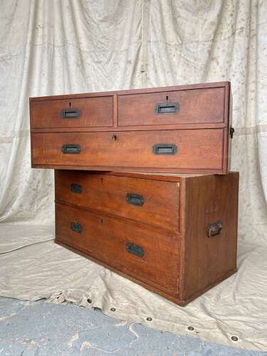 An antique 19th century three section teak campaign chest on chest with cupboard