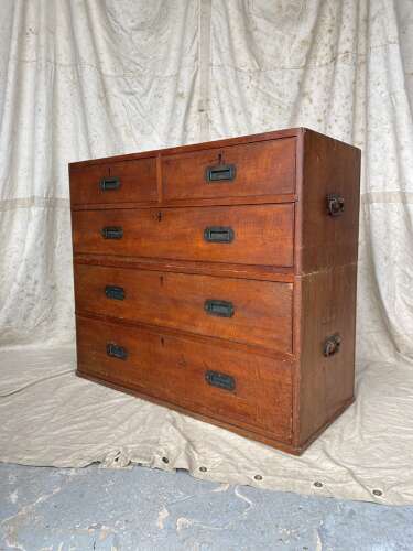 An antique 19th century three section teak campaign chest on chest with cupboard