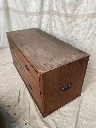 An antique 19th century three section teak campaign chest on chest with cupboard