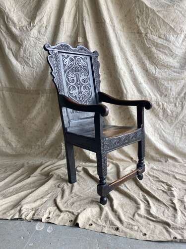 An antique early 19th century English oak Wainscot chair