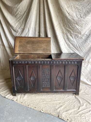 An antique 17th century James II oak coffer circa 1686