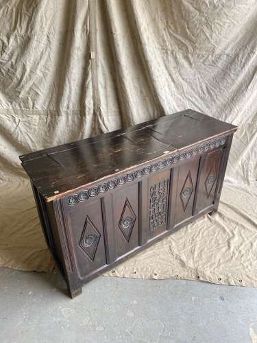 An antique 17th century James II oak coffer circa 1686